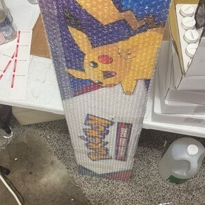 Pokemon Trading Cards with Pikachu - Yellow and Purple